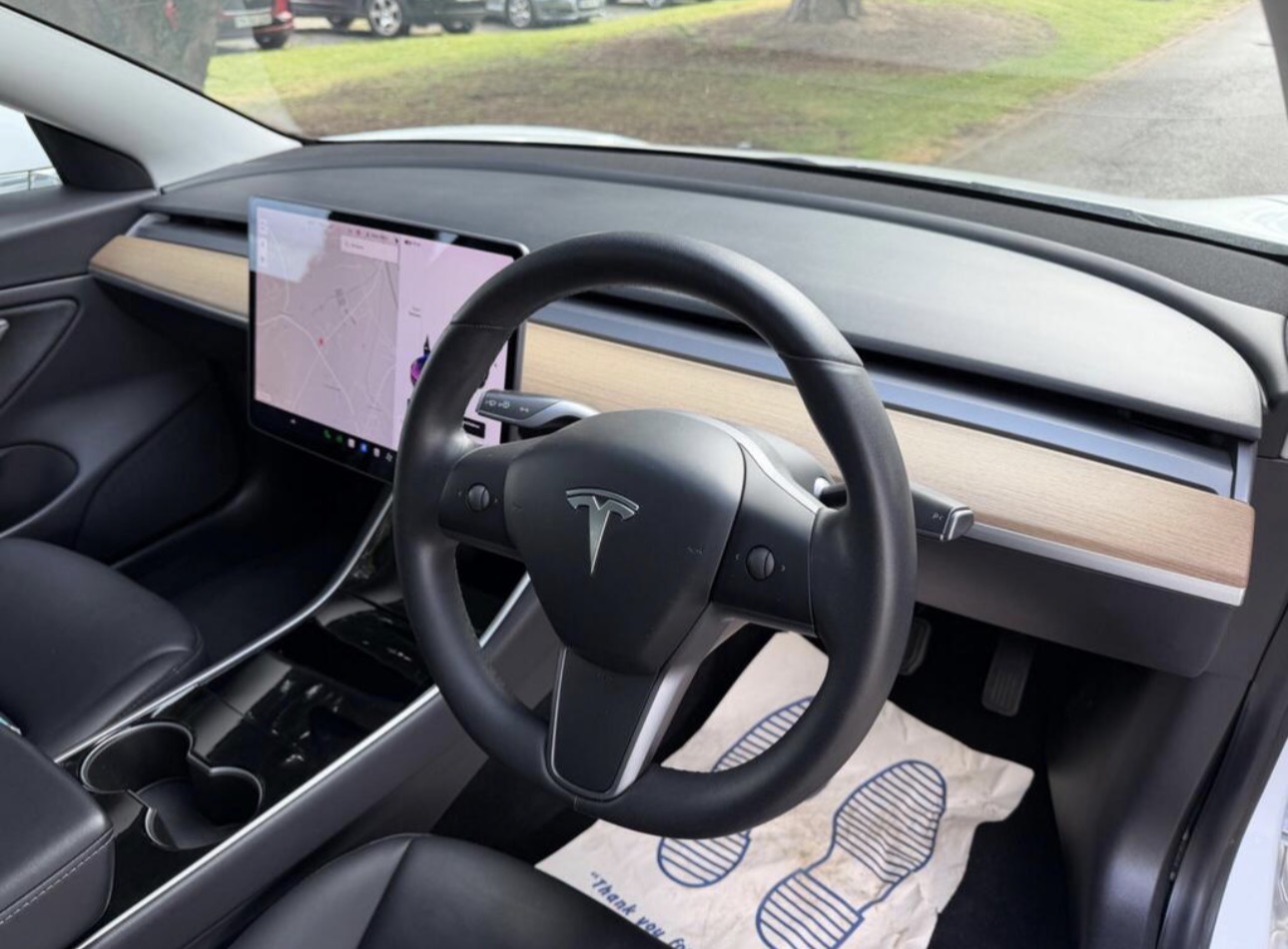 Tesla · Minimalist Cockpit